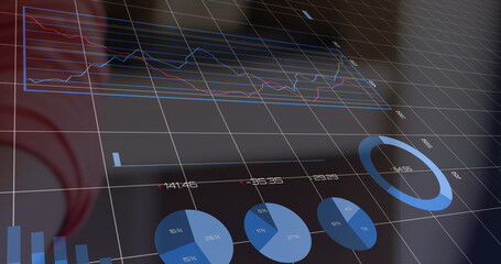 Displaying data visualization dashboard in control room, with 3D wireframe grid and multiple charts