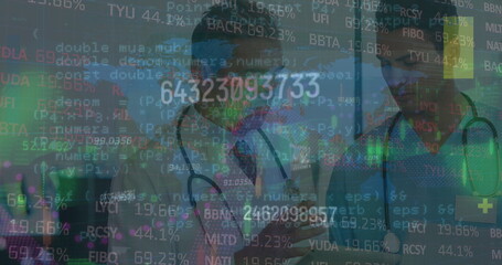 Obraz premium Image of moving trading board, programming codes over smiling caucasian male doctors discussing