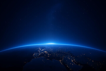 Obraz premium Earth from Space at Night with City Lights and Glowing Atmosphere