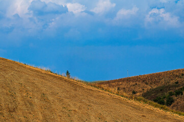 summer countryside landscape inside Val d'Agri, Basilicata, Italy