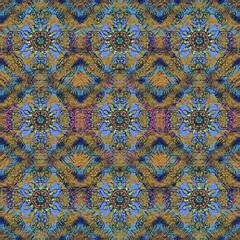 Seamless psychedelic mandala pattern with a blurred, fuzzy Ikat texture. The ornate geometric design features jewel tones of gold, blue, purple, and teal. Ideal for luxury bohemian textiles and decora