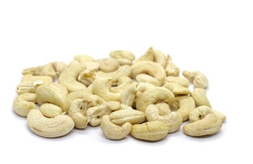 Closeup of Cashew Nut Heap Isolated on White Background with Copy Space, Healthy Eating Dry Fruit