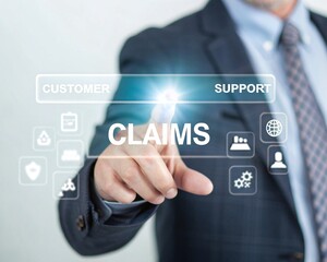 Efficient Claims Processing: Businessman Interacting with Digital Claims System