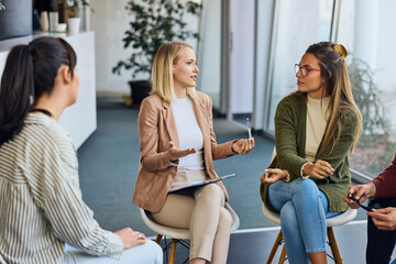 Group Discussion Among Women Collaborating in a Relaxed Office Environment