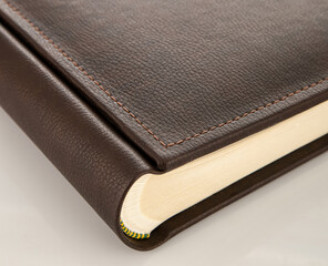 Elegant brown leather photo album showing high quality binding
