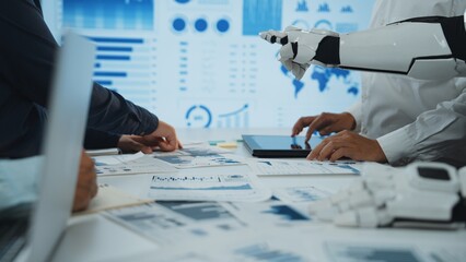 A dynamic office scene showcasing human hands collaborating with a robotic arm while analyzing data...
