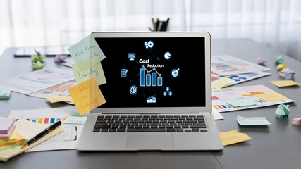 Fototapeta na wymiar Cost reduction, cost saving concept shown on computer screen brisk, corporate business efficiently save cost and company resources by reduction of unnecessary expenses