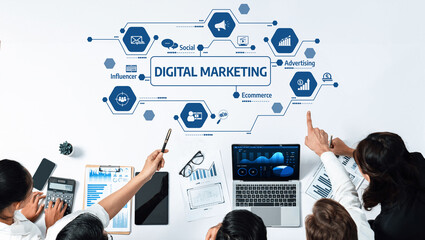 A diverse team collaborates on digital marketing strategies, utilizing various tools and data analytics to drive effective advertising and ecommerce solutions. Amity