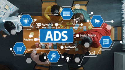 A dynamic team brainstorming advertising strategies using visual tools, showcasing the integration of social media and online ads for effective marketing solutions. Amity