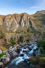 Mountain Rock Cliffs above Urubamba River Rough Water Streams in Ollantaytambo Village, Sacred Valley, Peru;