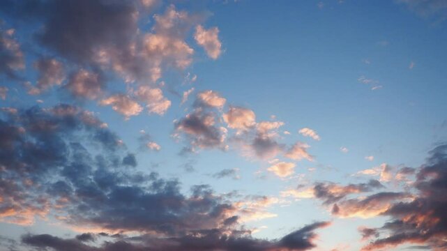Watch as the evening sky transforms with breathtaking clouds shifting colors as the sun sets. This enchanting time lapse reveals the dynamic beauty of twilight and changing light