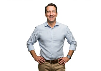 Happy middle aged man smiling confidently in a light blue shirt
