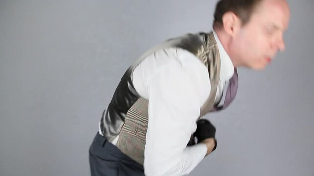 Vintage Ruffian or Back Alley Brawler Punching and Beating Himself Up. Punch and Oof Body Blow Sound Effects.