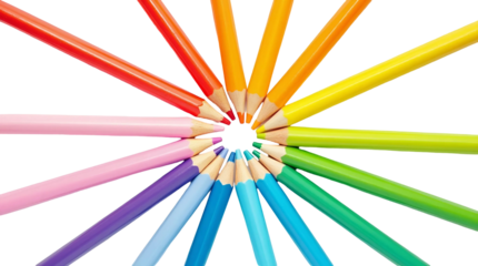 Top view of rainbow-colored pencils arranged in a radial pattern from a central point on a white background with crisp shadows