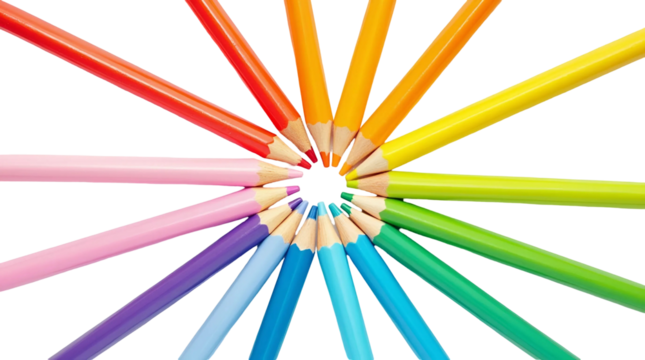 Top view of rainbow-colored pencils arranged in a radial pattern from a central point on a white background with crisp shadows