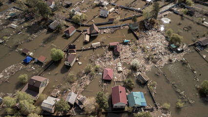 Fototapeta na wymiar Global warming, floods on the planet.The apocalypse, catastrophes.Storms and destruction.Natural disasters,climate change,the riot of nature.The remnants of human life are floating in dirty water.End