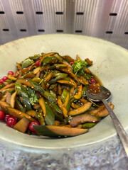 Oi mochim or muchim korean spicy salad with sesame seeds