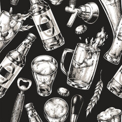 Beer bottles and glasses on black