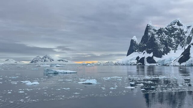 Big Iceberg in Antarctica Winter Scenery, Amazing Shape Ice Formation of Massive Large Enormous Blue Icebergs in Antarctic Peninsula Landscape Seascape with Ocean Sea Water