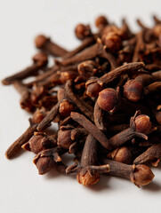 Fototapeta premium Pile of Dried Cloves on White Background
