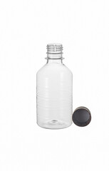 A plastic bottle with a brown cap in close-up on a white background