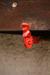red valve on a wall