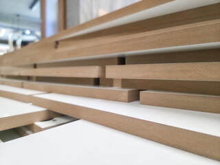 Wooden boards arranged in a modern architecture studio during daylight showcasing craftsmanship and design creativity