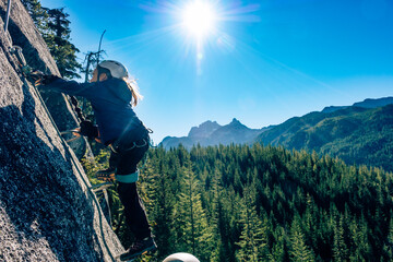 Climber on a cliff, Via Ferrata, Sea to Sky , Squamish, British Columbia, Canada