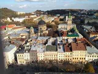 Obraz premium panoramic view of the city of Lviv, view from the top, cathedral, drone, European city, houses, street, brown, ancient houses, 