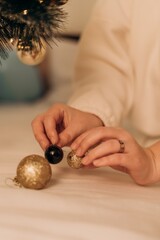 Young mother and her child share meaningful celebration decorating holiday tree together in warm atmosphere of love care and everyday tenderness creating lasting memories