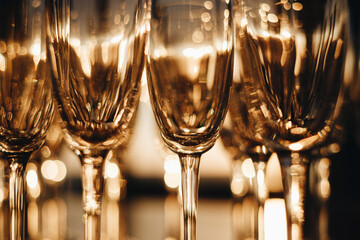 Elegant Crystal Glasses with Warm Bokeh