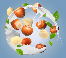 Nut milk splash with hazelnuts and green leaves in air on color gradient background