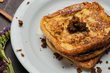 Traditional Latin American sweet bread toast with strawberry and milk, tropical setup

