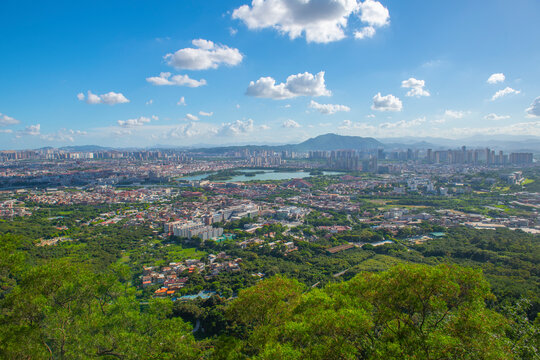 Quanzhou city aerial view including historic Licheng district and Xihu (West Lake) Park, from top of Mount Qingyuan, Quanzhou, Fujian Province, China.   