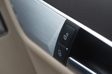 Car door control panel with lock or unlock buttons