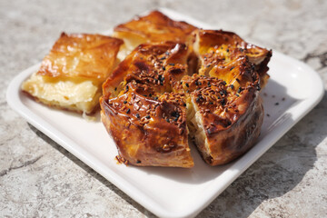 Freshly baked pastries served on a white plate