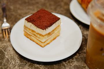 Delicious dessert served on a plate at a cozy cafe