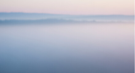 Fototapeta premium Misty Morning Landscape: Serene landscape photo of a misty morning, soft light filtering through the fog, creating a dreamy atmosphere.