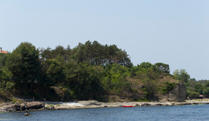 Obraz premium Resorts in Bulgaria. Kiten, Burgas Province, Bulgaria. The Black Sea coast, made of sedimentary rocks.