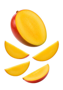 flying mango fruit and half slices isolated on white or transparent background. PNG, clipping path