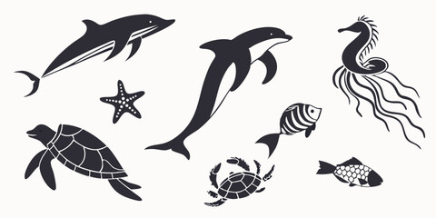 Vector set of sea animals including fish dolphin shark and birds in silhouette style