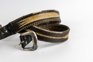 Black leather and fabric belt with silver buckle and tribal motif. Stylish and functional men's...