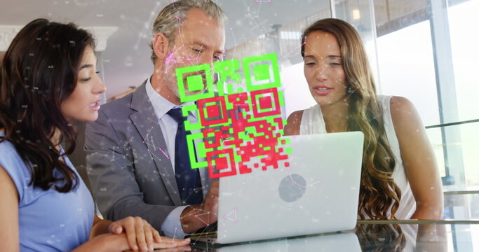 Image of connected dots and qr code over caucasian coworkers discussing over laptop in office - Powered by Adobe