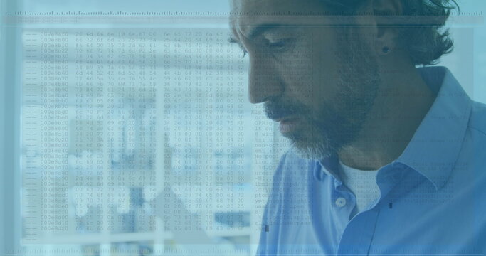 Image of data processing against close up of caucasian senior man using laptop at office