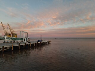 Pier on the La Plata River at sunset. Space for text. Copy space 