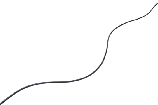 Single Black Electrical Power Cord Winding Through Empty Space on a Black Background in Studio Lighting