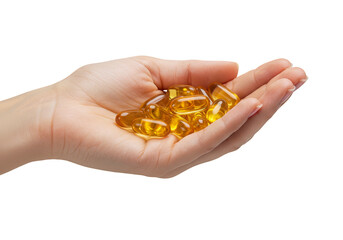 Isolated Image of Hand Holding Golden Omega Fish Oil Supplements