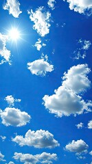 Bright blue sky with puffy white clouds