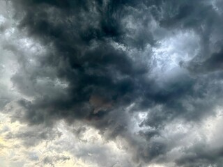 Obraz premium Dramatic dark storm clouds in the sky, natural background.