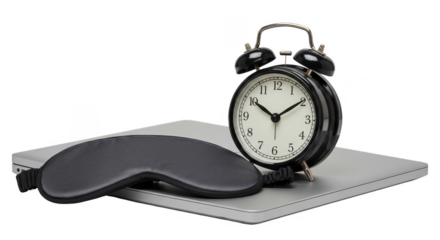 Isolated Still Life of Alarm Clock Sleep Mask and Laptop